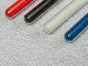 Close-up of plastic polymer granules. polymer plastic. compound polymer. plastic beads. Products for making plastic bottles.